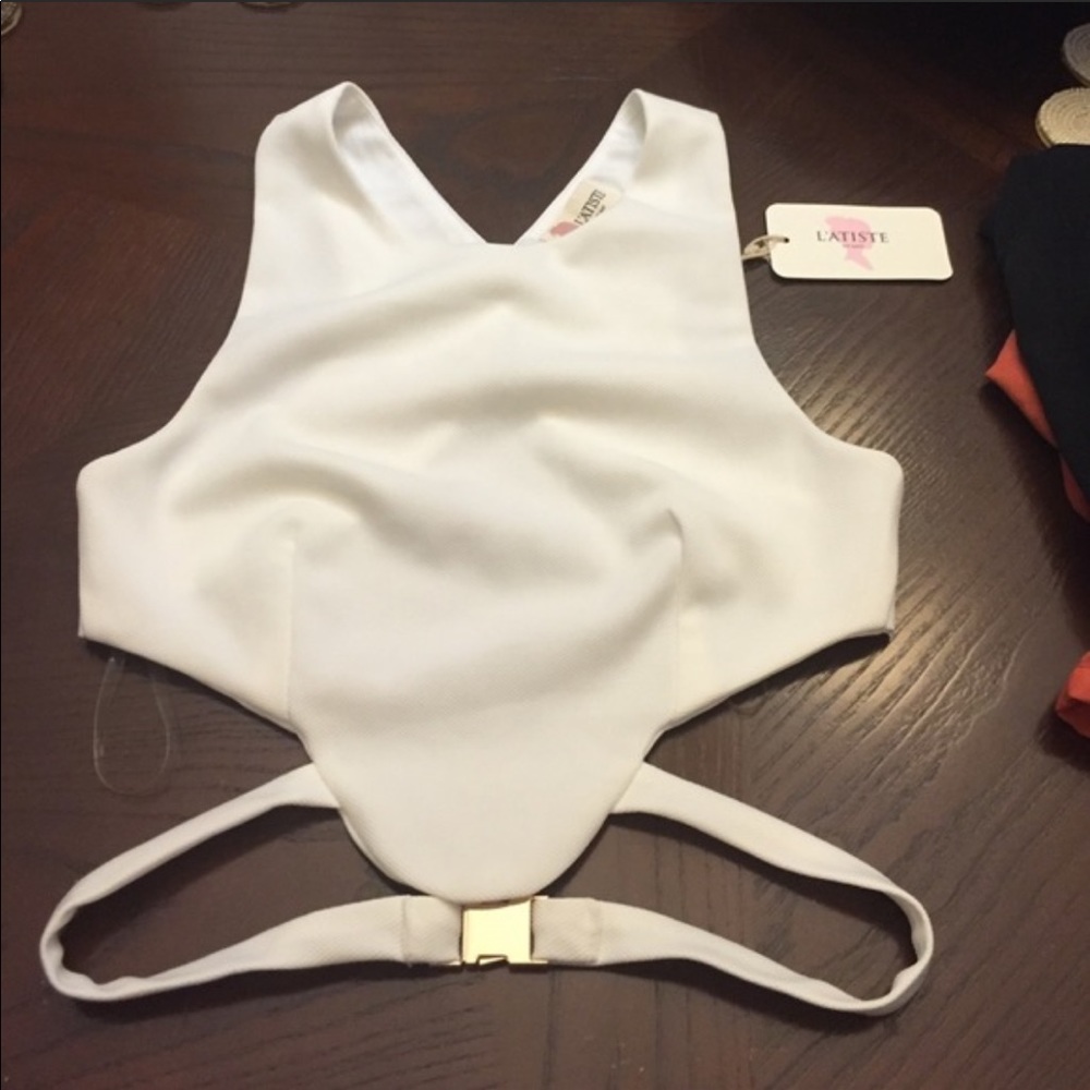 White crop top with gold buckle
